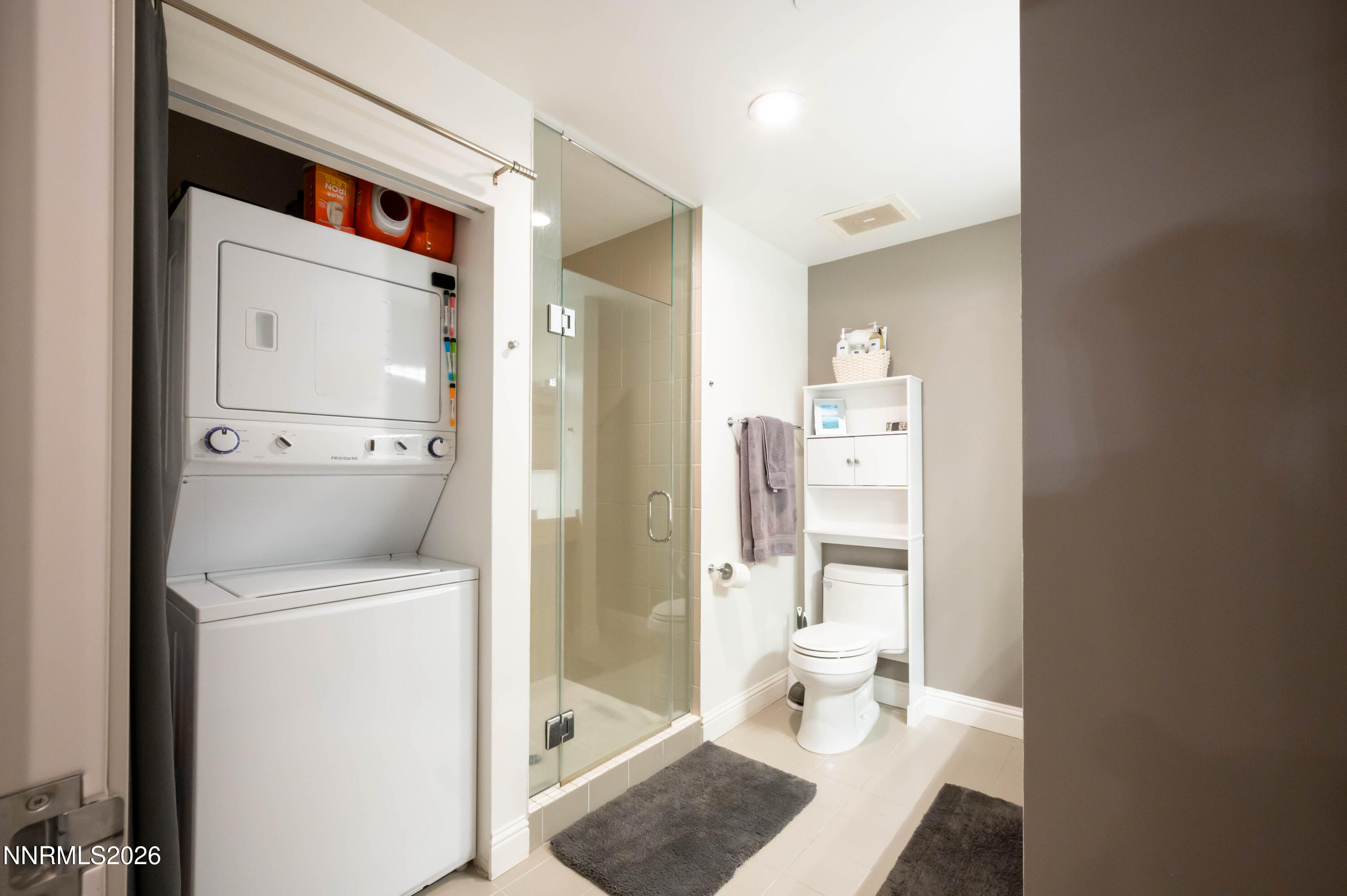 255 North Sierra Street, Unit 517 Reno, NV 89501 - Photo 27 of 43 a bathroom with a sink a toilet and shower