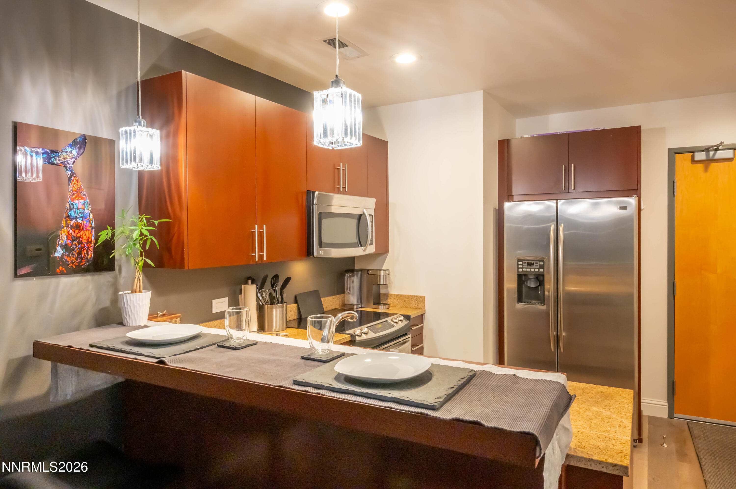 255 North Sierra Street, Unit 517 Reno, NV 89501 - Photo 29 of 43 a bathroom with a sink and a mirror