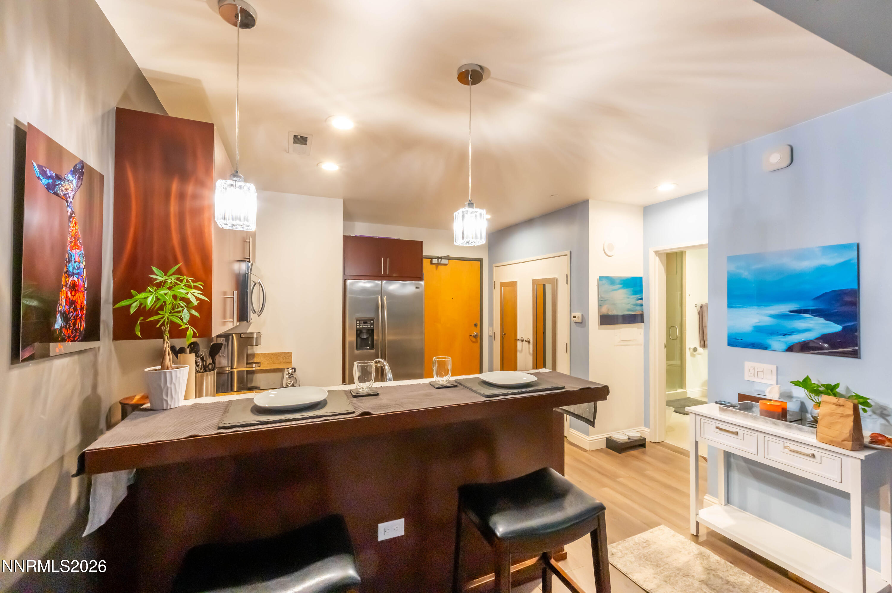 255 North Sierra Street, Unit 517 Reno, NV 89501 - Photo 30 of 43 a bathroom with a sink and a large mirror