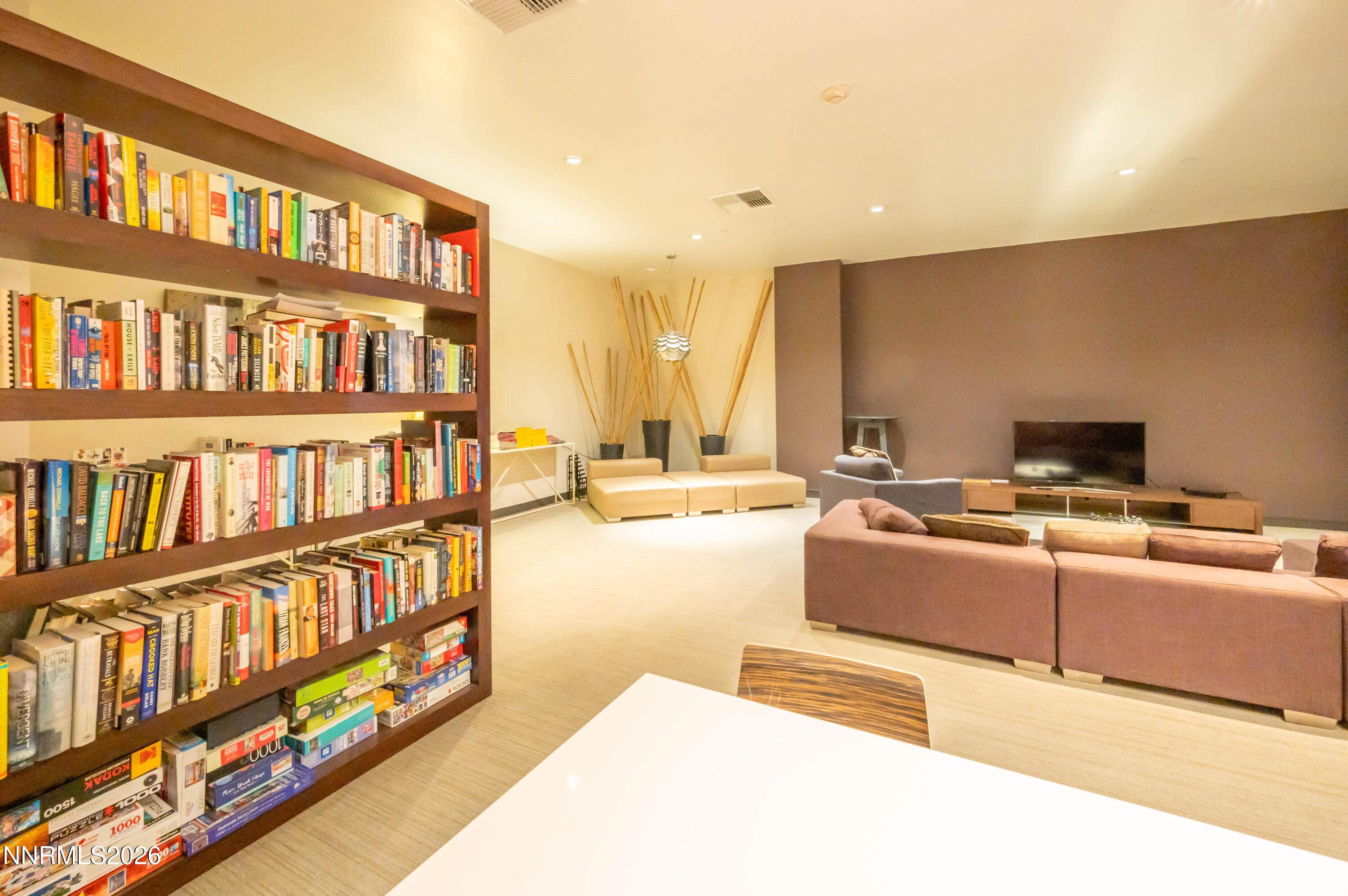255 North Sierra Street, Unit 517 Reno, NV 89501 - Photo 37 of 43 a living room with furniture and a book shelf