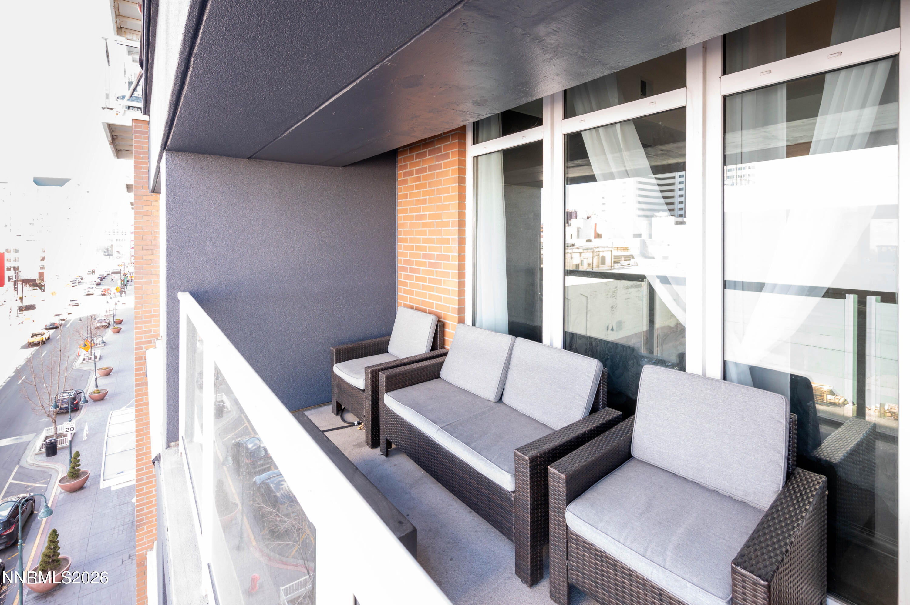 255 North Sierra Street, Unit 517 Reno, NV 89501 - Photo 9 of 43 a living room with furniture and a window