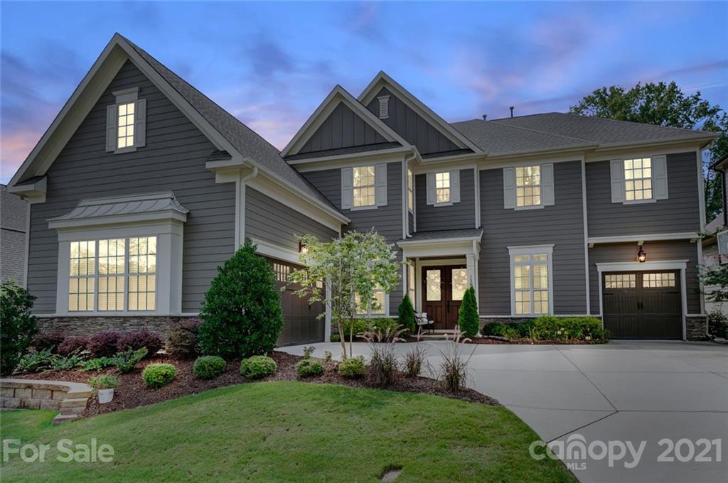 1362 Afton Way Fort Mill, SC 29708 - Photo 2 of 48 a front view of a house with a garden and plants
