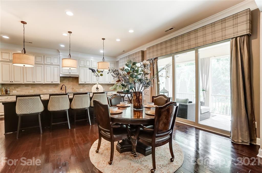 1362 Afton Way Fort Mill, SC 29708 - Photo 15 of 48 a dining room with furniture window wooden floor