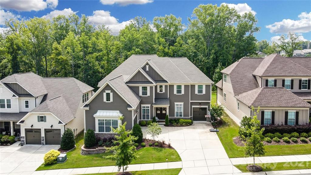1362 Afton Way Fort Mill, SC 29708 - Photo 3 of 48 a aerial view of a brick house next to a yard