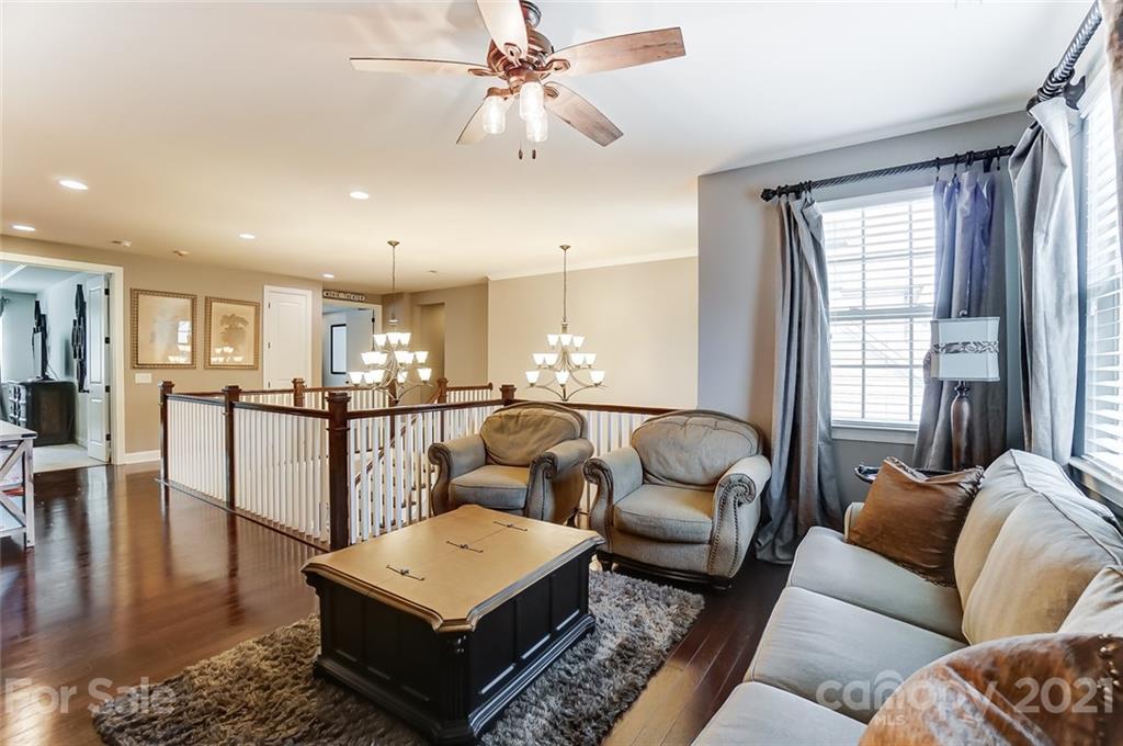 1362 Afton Way Fort Mill, SC 29708 - Photo 26 of 48 a living room with furniture ceiling fan and a window