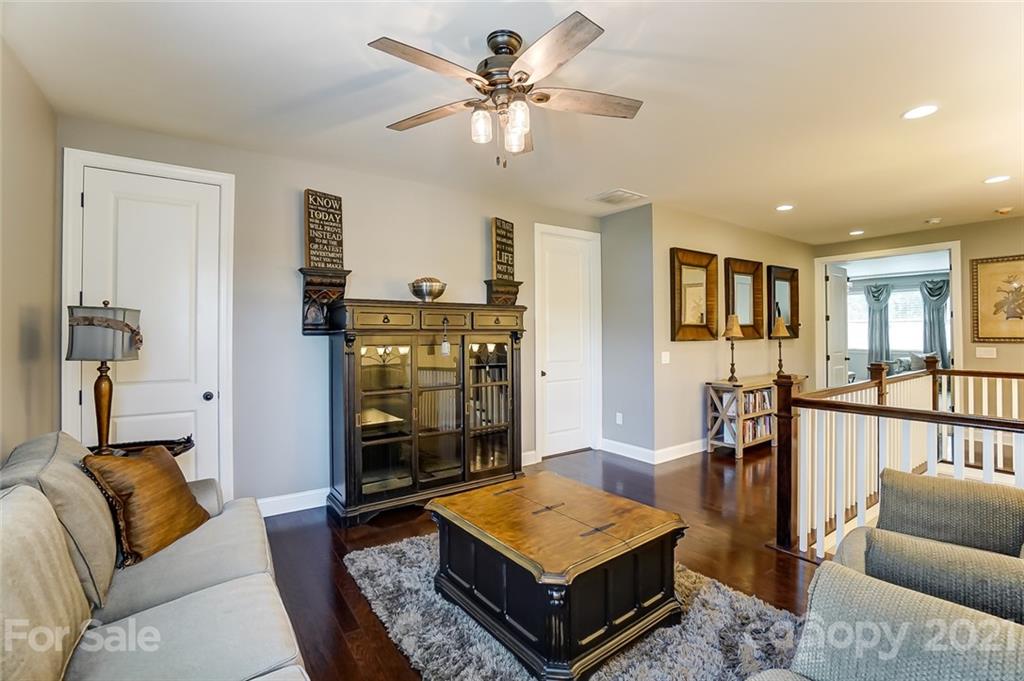 1362 Afton Way Fort Mill, SC 29708 - Photo 27 of 48 a living room with furniture and a flat screen tv