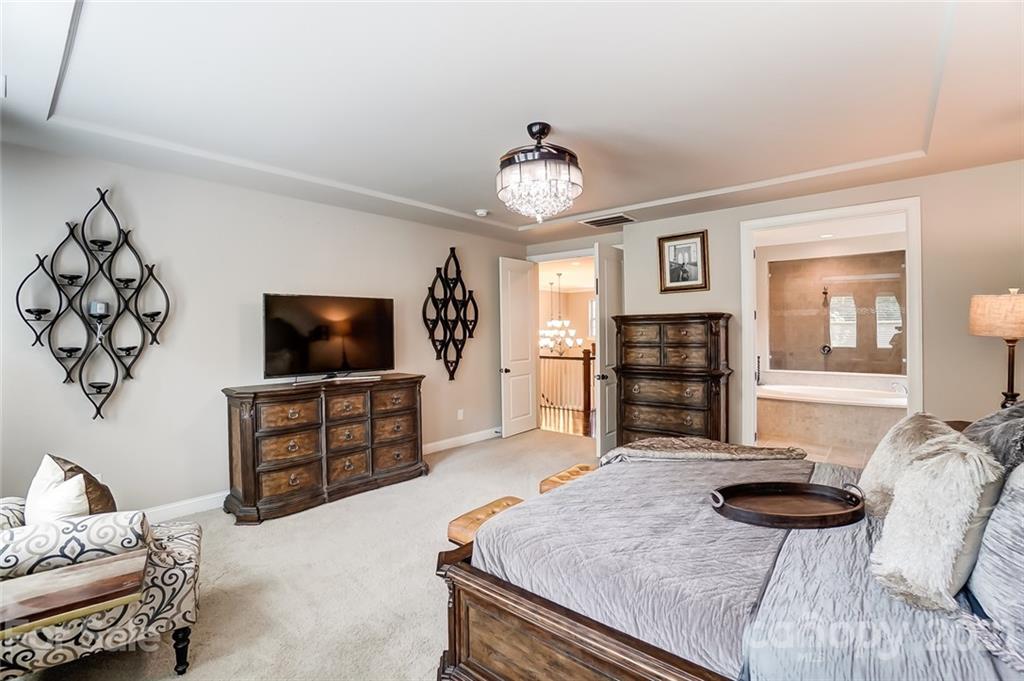 1362 Afton Way Fort Mill, SC 29708 - Photo 30 of 48 a bedroom with furniture and a flat screen tv