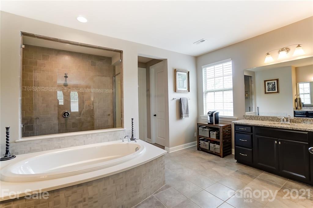 1362 Afton Way Fort Mill, SC 29708 - Photo 31 of 48 a spacious bathroom with a tub sink and mirror