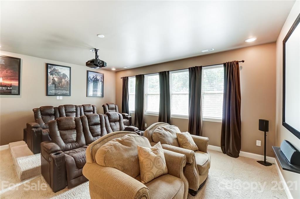 1362 Afton Way Fort Mill, SC 29708 - Photo 34 of 48 a living room with furniture and large windows