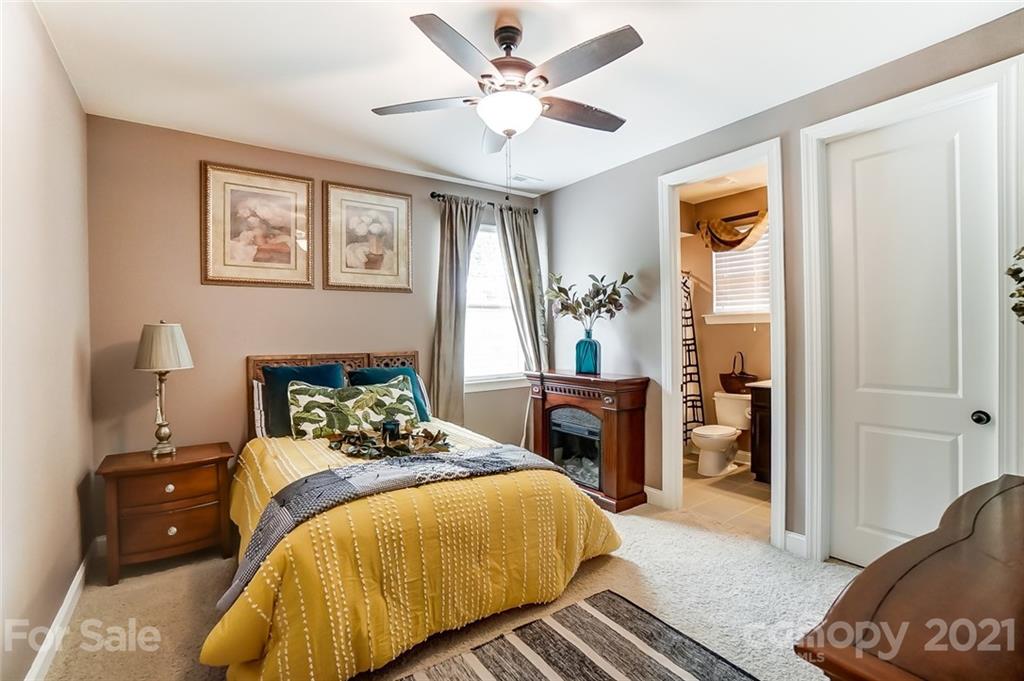 1362 Afton Way Fort Mill, SC 29708 - Photo 37 of 48 a bedroom with a bed and wooden floor