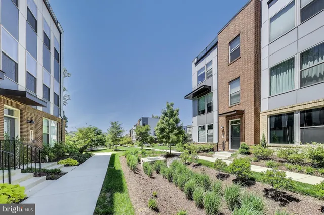 a view of a building with a yard