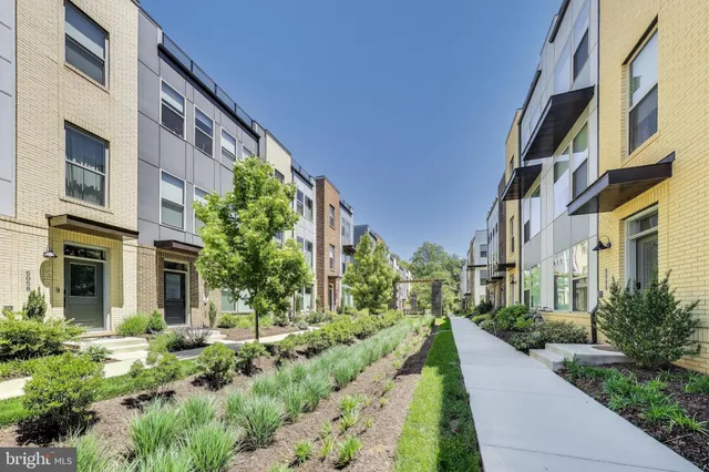 a view of a building with a yard