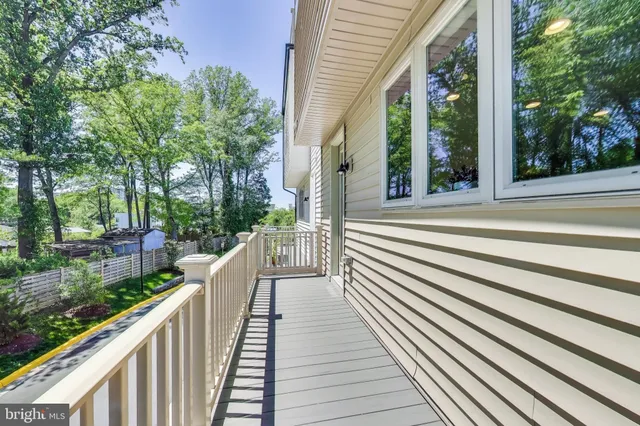 a view of a two chairs in balcony