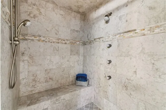 a bathroom with a sink and mirror