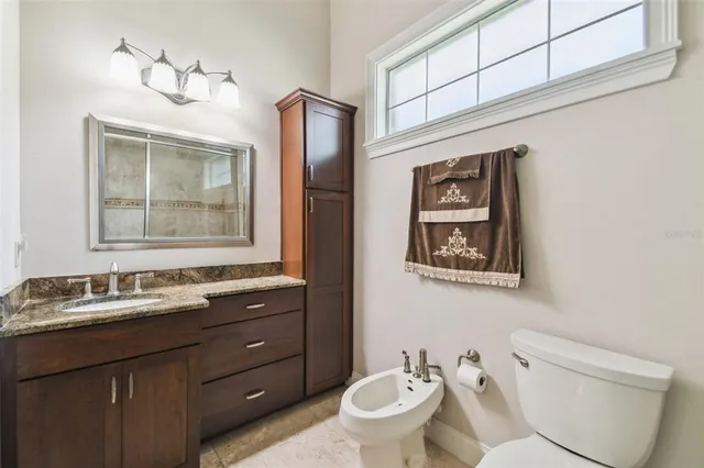 a view of a swimming pool with a yard