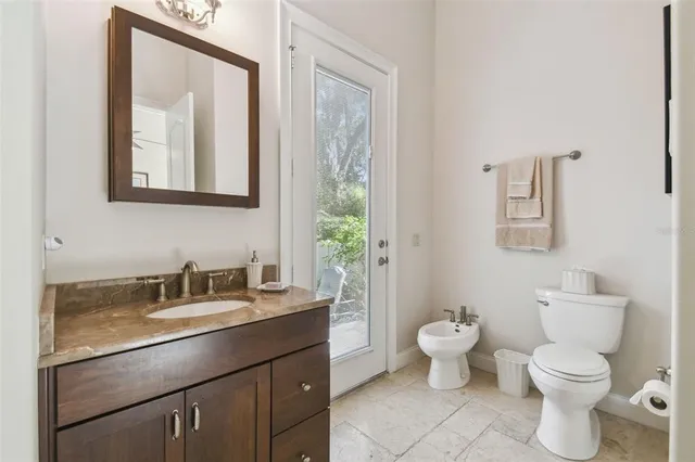 a view of a backyard with swimming pool