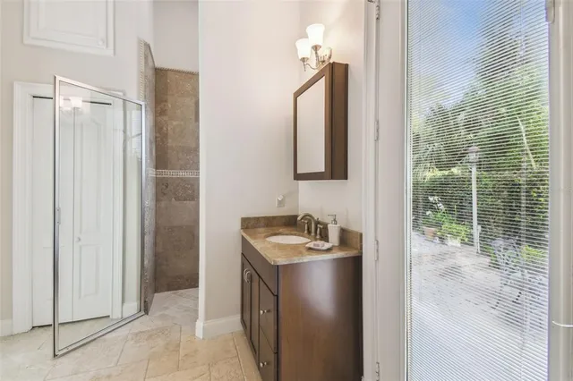 a view of backyard with seating area and green space