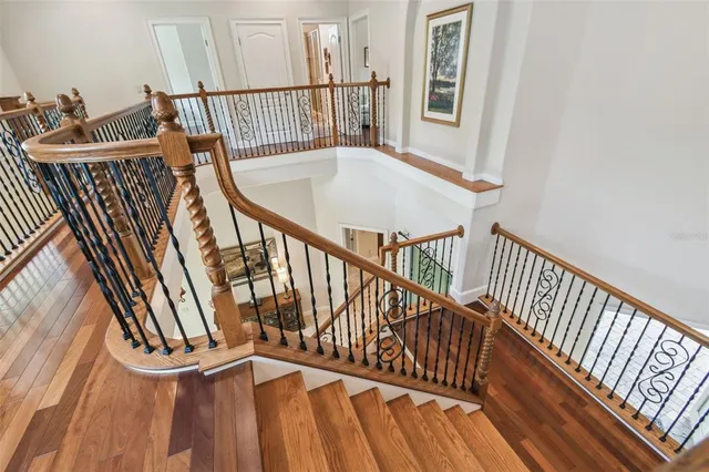 an aerial view of a houses with outdoor space and lake view