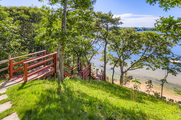 217 Barnes Road Oak Bluffs, MA 02557 - Photo 57 of 60 a backyard of a house with lots of green space
