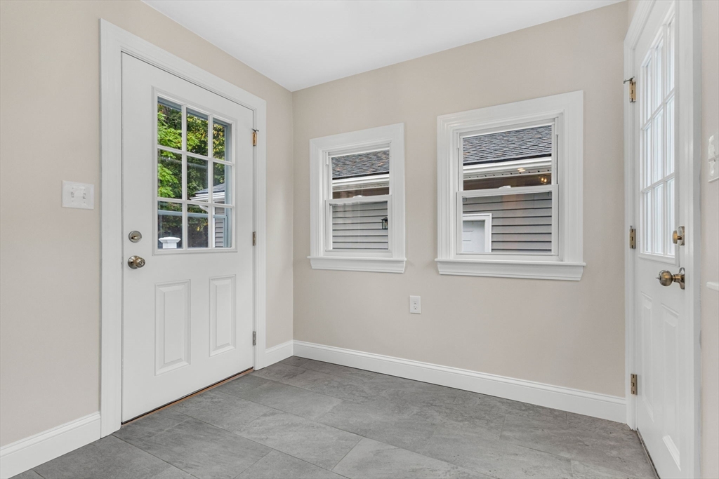 26 Navy Yard Road Dracut, MA 01826 - Photo 23 of 39 a view of an empty room with a window