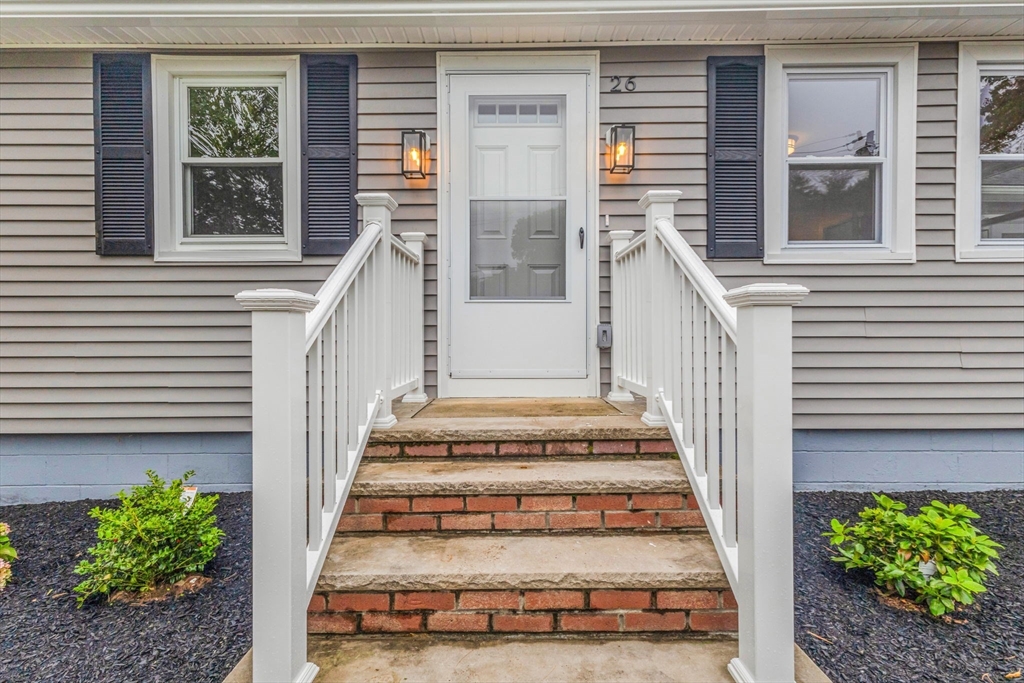 26 Navy Yard Road Dracut, MA 01826 - Photo 7 of 39 a view of a entryway front of house