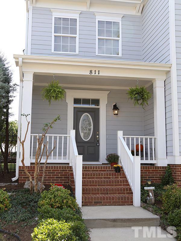 811 Chapanoke Road Raleigh, NC 27603 - Photo 2 of 25 a front view of a house with a garden