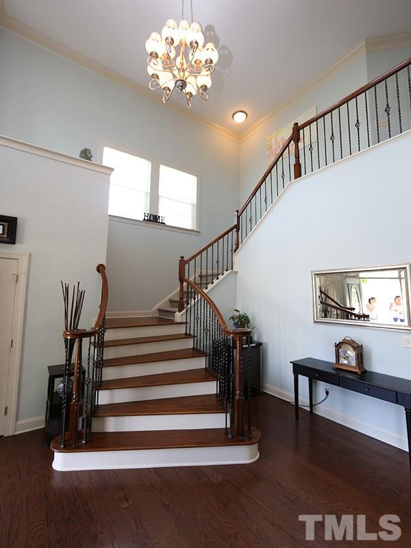 811 Chapanoke Road Raleigh, NC 27603 - Photo 12 of 25 a view of entryway and hall with wooden floor