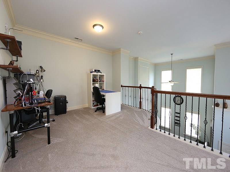811 Chapanoke Road Raleigh, NC 27603 - Photo 13 of 25 a view of a room with gym equipment