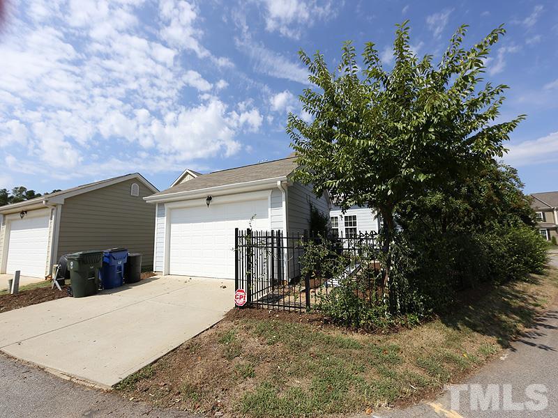 811 Chapanoke Road Raleigh, NC 27603 - Photo 20 of 25 a view of a house with a yard