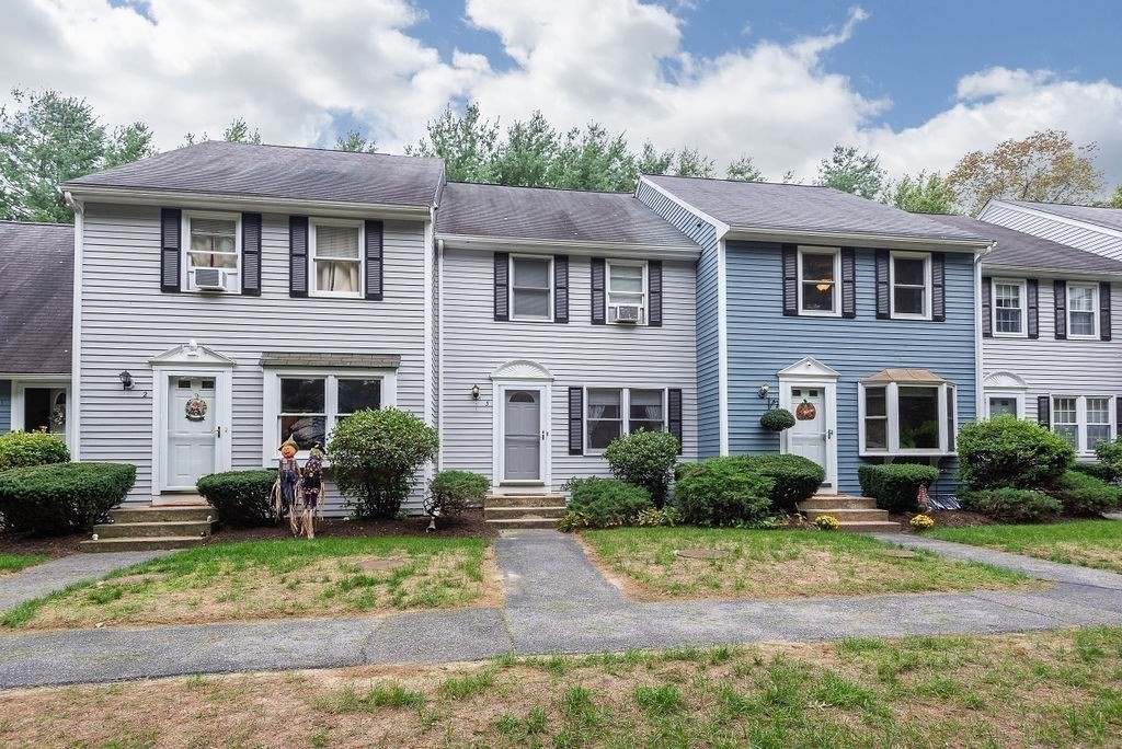 1 Spruce Tree Lane, Unit 3 Norton, MA 02766 - Photo 16 of 18 a front view of a house with garden