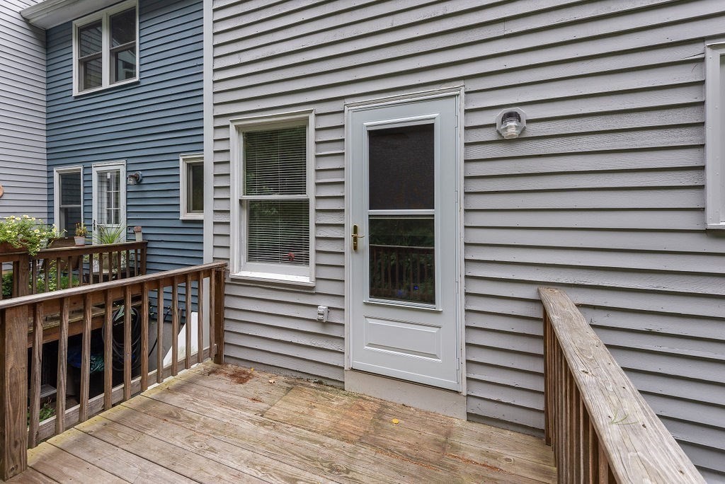 1 Spruce Tree Lane, Unit 3 Norton, MA 02766 - Photo 18 of 18 a view of a house with a door and a window