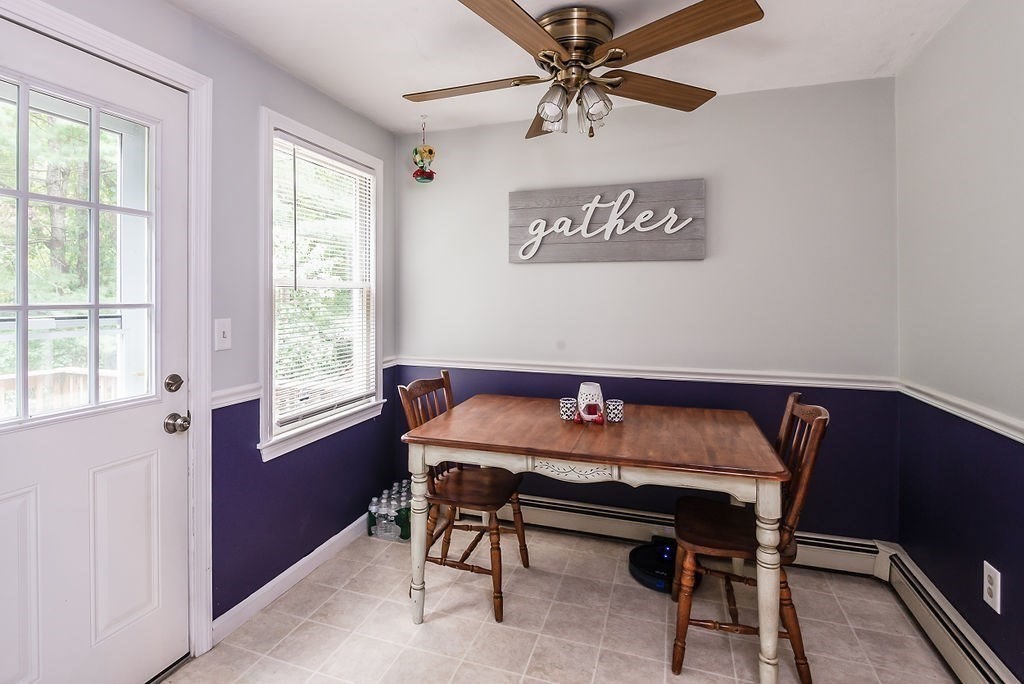 1 Spruce Tree Lane, Unit 3 Norton, MA 02766 - Photo 4 of 18 a view of a dining room with furniture and window