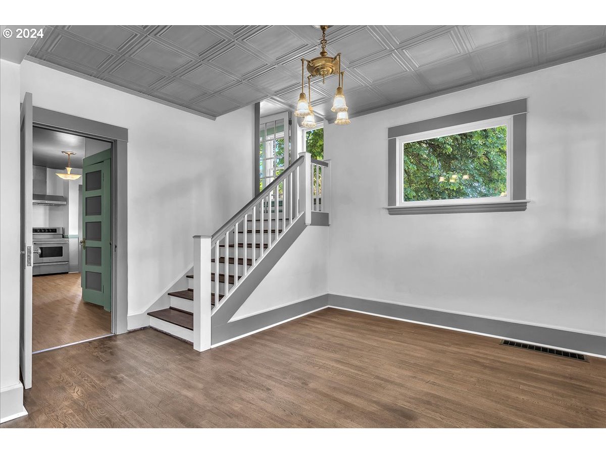 54886 Fullerton Road Scappoose, OR 97056 - Photo 14 of 42 a view of an entryway with wooden floor