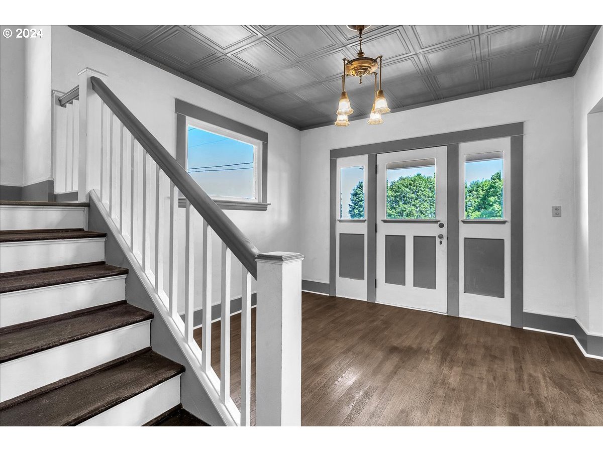 54886 Fullerton Road Scappoose, OR 97056 - Photo 21 of 42 a view of entryway and hall with wooden floor