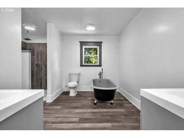 a en suite bathroom with a sink and a mirror