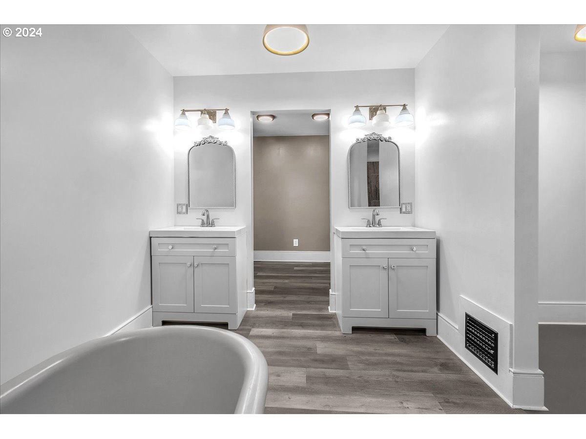 54886 Fullerton Road Scappoose, OR 97056 - Photo 30 of 42 a en suite bathroom with a sink and a mirror