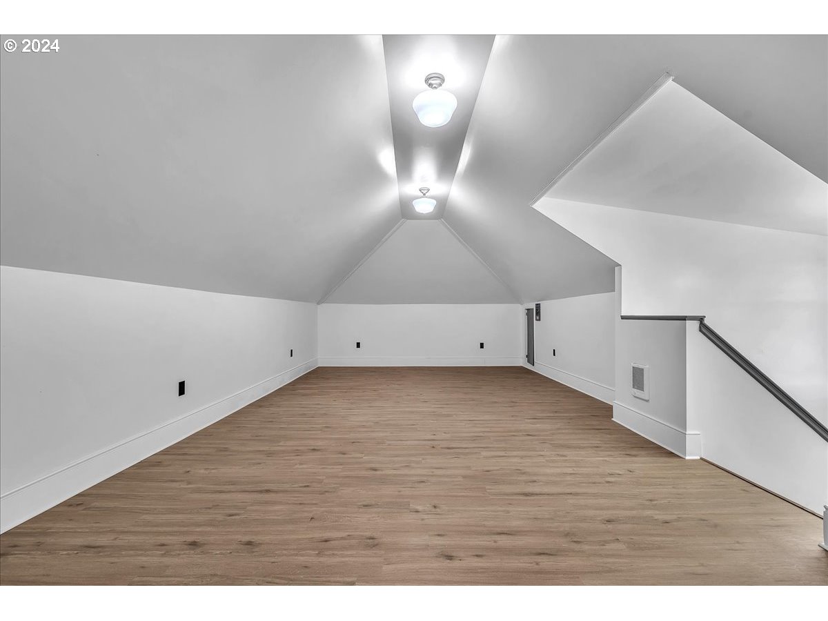 54886 Fullerton Road Scappoose, OR 97056 - Photo 39 of 42 a view of a room with wooden floor