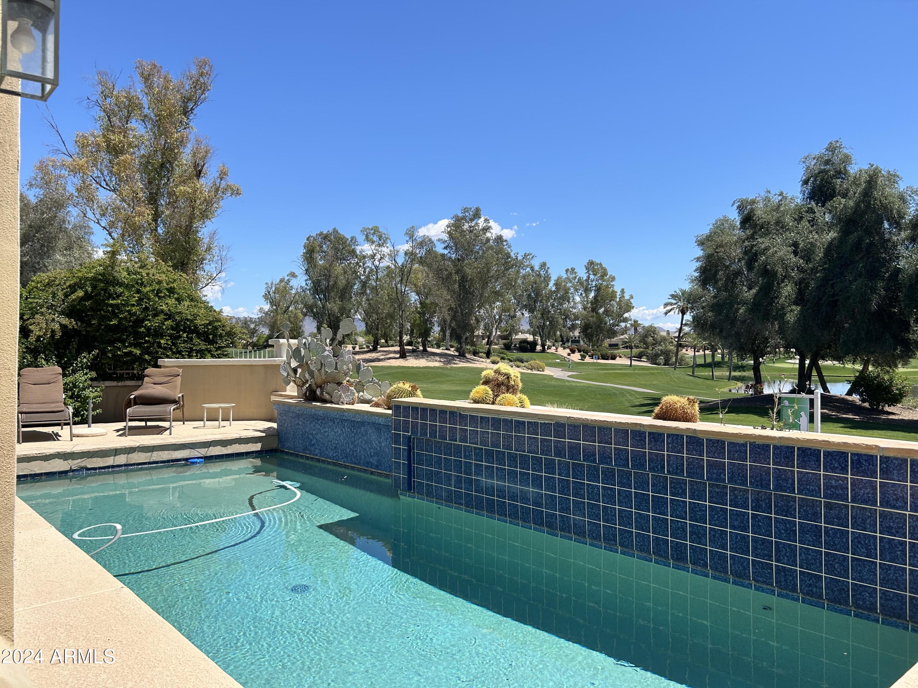 7323 East Gainey Ranch Road, Unit 3 Scottsdale, AZ 85258 - Photo 4 of 10 POOL IN BACKYARD