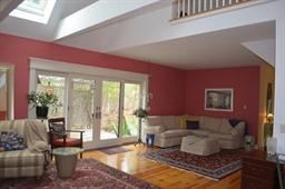 35 Ridge St Extension Wellfleet, MA 02667 - Photo 12 of 24 a living room with furniture and a large window