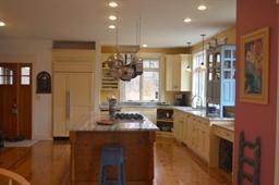 35 Ridge St Extension Wellfleet, MA 02667 - Photo 16 of 24 a kitchen with a sink stove and refrigerator
