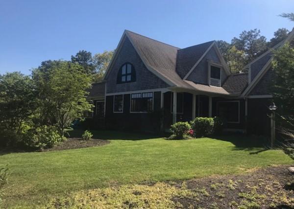 35 Ridge St Extension Wellfleet, MA 02667 - Photo 24 of 24 a front view of a house with garden