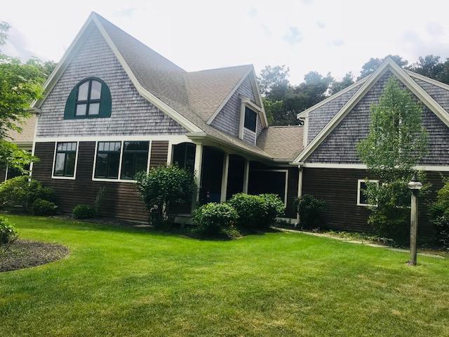 35 Ridge St Extension Wellfleet, MA 02667 - Photo 4 of 24 a view of a house with a yard and plants