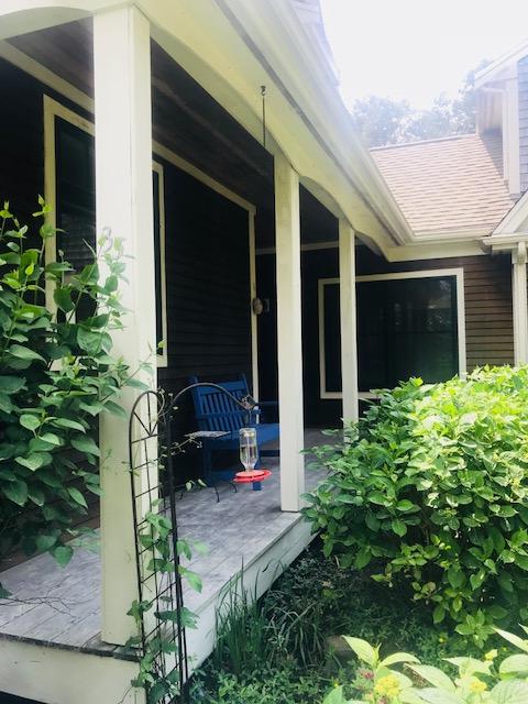 35 Ridge St Extension Wellfleet, MA 02667 - Photo 6 of 24 a backyard of a house with outdoor seating