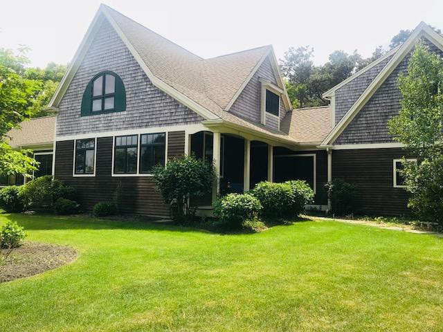 35 Ridge St Extension Wellfleet, MA 02667 - Photo 9 of 24 a view of a house with a yard and plants
