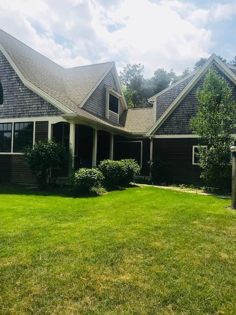 35 Ridge St Extension Wellfleet, MA 02667 - Photo 10 of 24 a front view of house with yard and green space