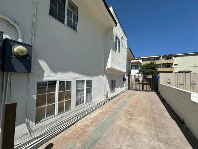 a view of living room with furniture and window