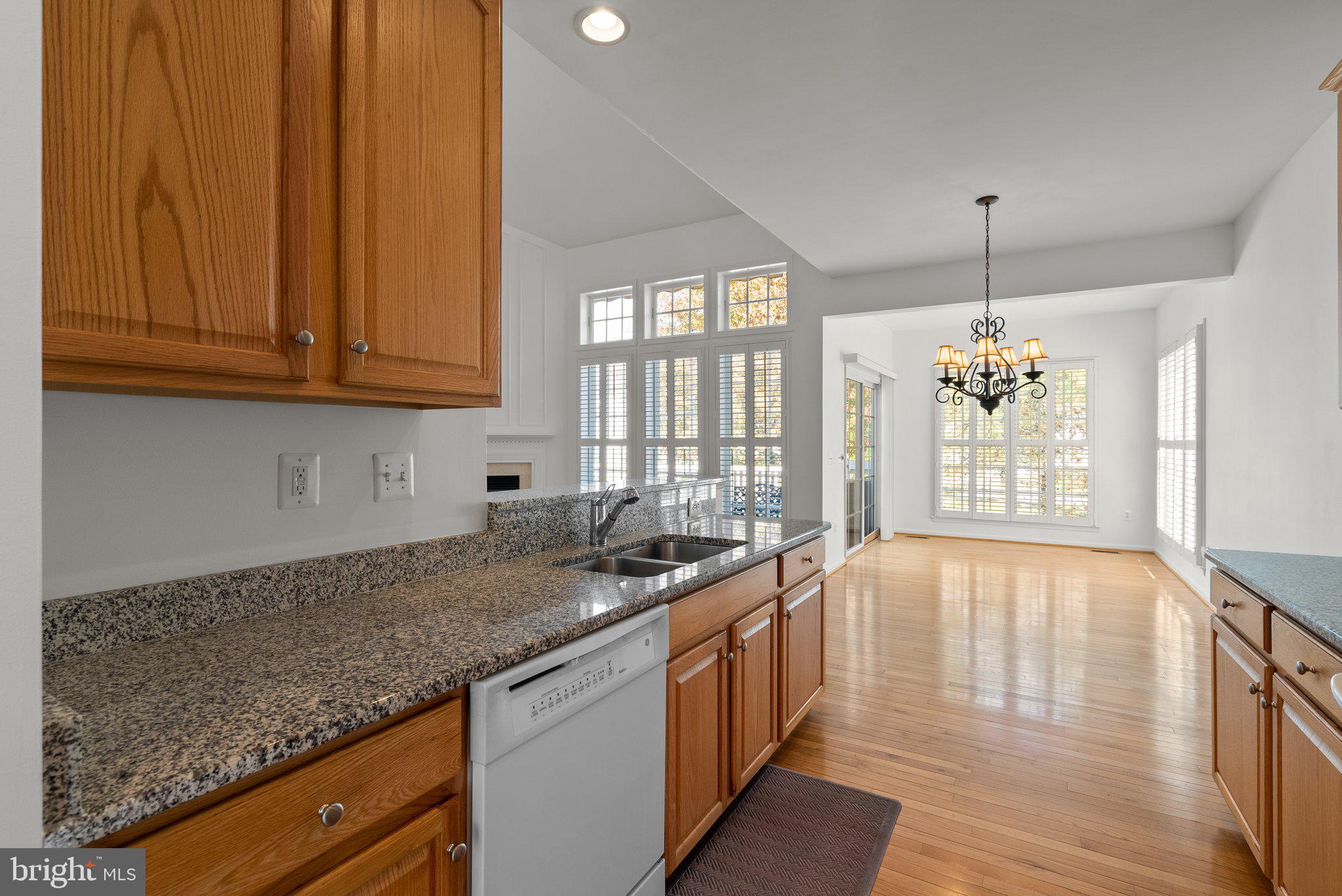 1256 Destiny Circle Annapolis, MD 21409 - Photo 11 of 49 a kitchen with granite countertop a sink cabinets and window