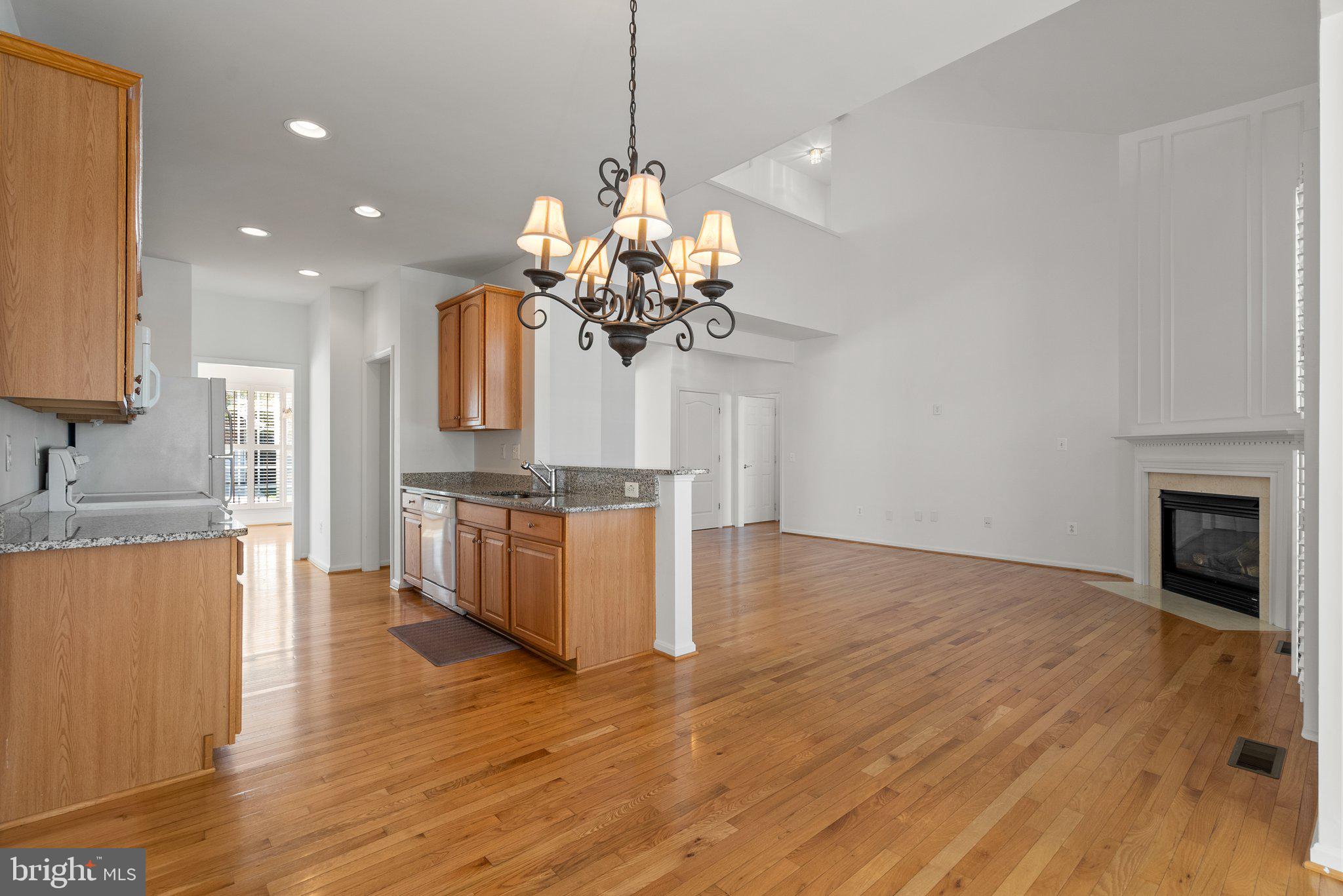 1256 Destiny Circle Annapolis, MD 21409 - Photo 15 of 49 a view of a kitchen with a sink a kitchen stove and a window