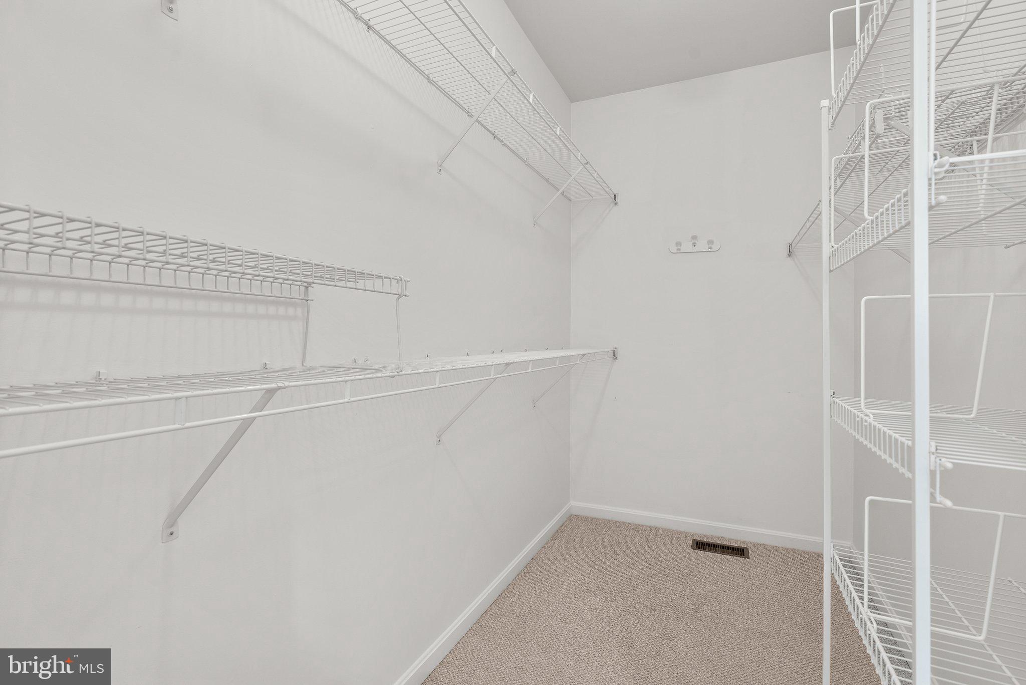1256 Destiny Circle Annapolis, MD 21409 - Photo 27 of 49 a view of an empty walk in closet