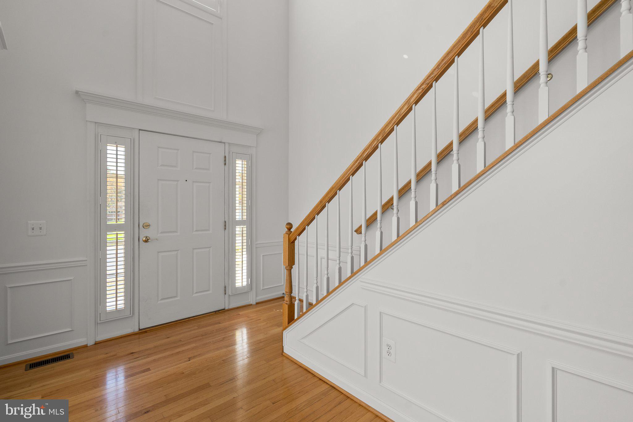 1256 Destiny Circle Annapolis, MD 21409 - Photo 3 of 49 a view of staircase with wooden floor and stairs